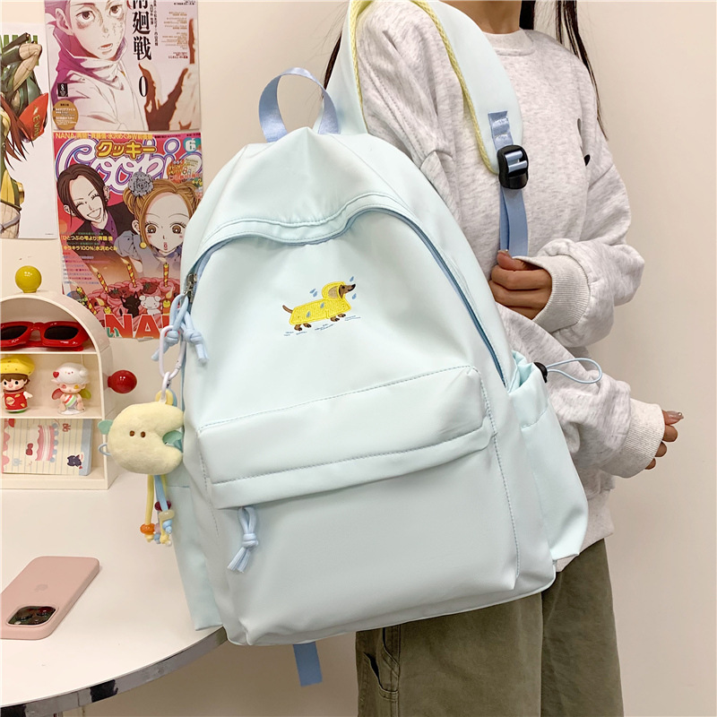 A new Japanese-style ins fresh and sweet candy-colored backpack for junior and senior high school students with a large capacity for light travel full figure