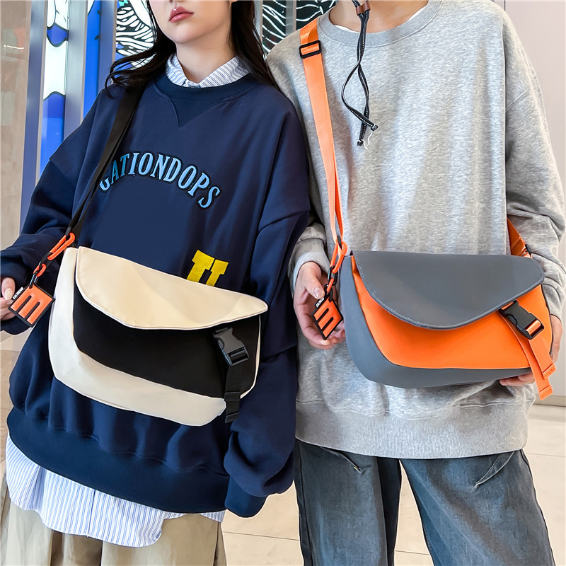 A new high-appearure-level fashionable messenger bag for both men and women, featuring simple color matching for casual commuting, large capacity and versatile single-shoulder crossbody details Picture