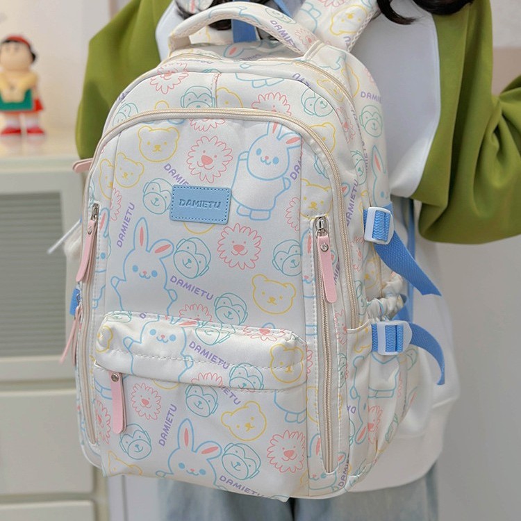A new style of simple and cute graffiti schoolbag for boys and girls, a trendy large-capacity student backpack for junior high school and senior high school Specification drawing