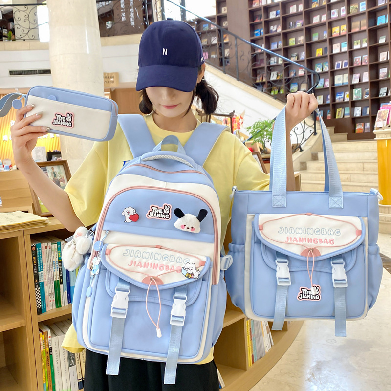 A new high-appeartion-level college style, fresh and sweet color-blocking patchwork tutorial bag, a lightweight travel backpack for junior and senior high school students details Picture