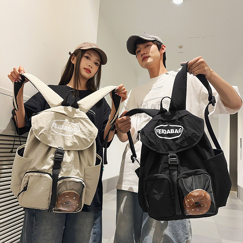 Korean-style ins high-appearance-level cool solid color backpacks for couples, casual, simple and lightweight travel backpacks with large capacity full figure