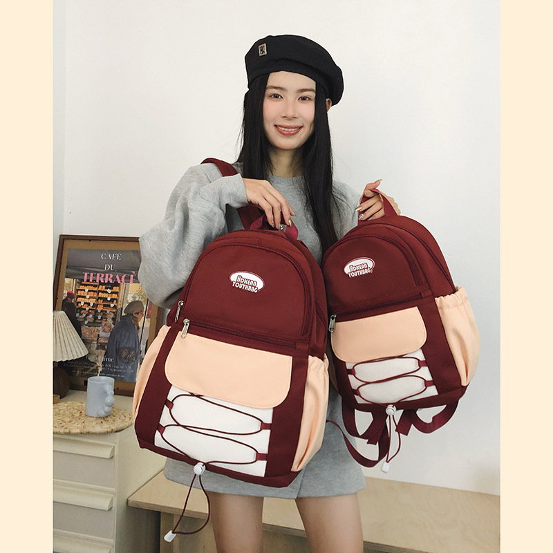 2025 New lightweight travel backpack, Korean-style nylon water-resistant backpack, simple schoolbag in various sizes full figure