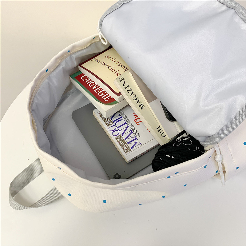 A new high-appearance-level forest-themed cute and fresh printed schoolbag for junior and senior high school girls, a casual, simple and lightweight backpack Application Scenario