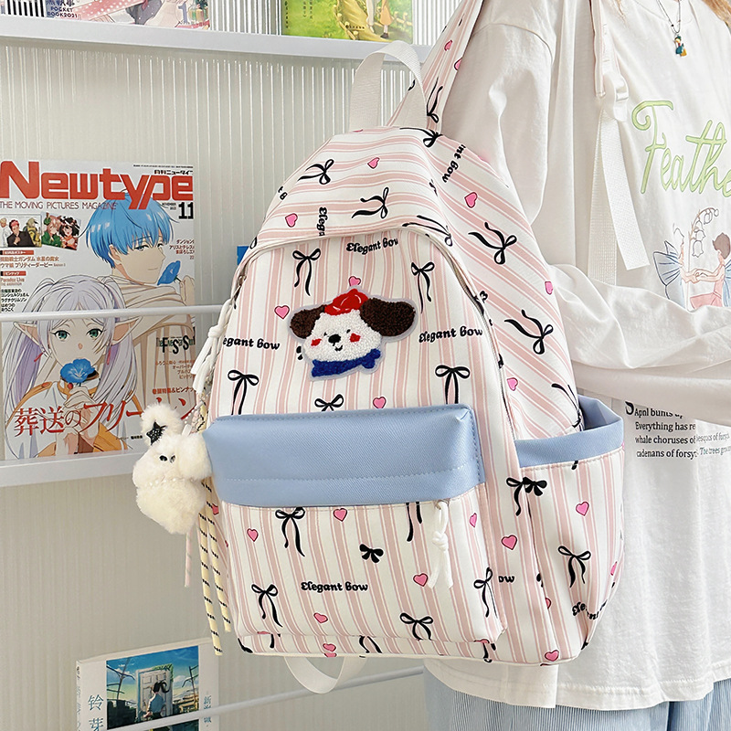 A new high-appearance-level Japanese ins fresh, sweet and cute bow dog backpack for junior and senior high school students details Picture