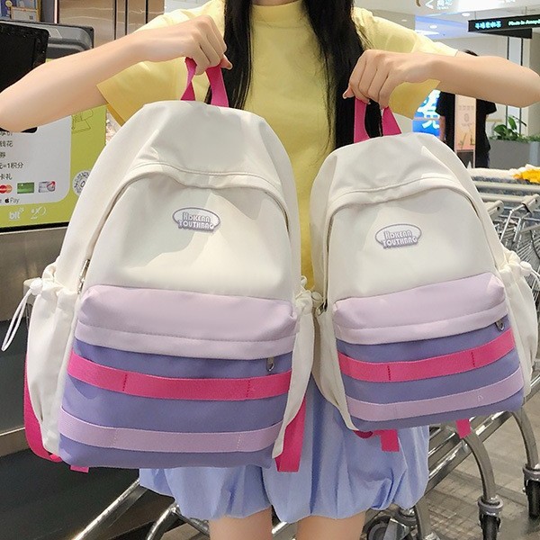 A new high-appeal cartoon girl style Japanese-style Instagram fresh and color-blocking backpack for junior and senior high school students full figure