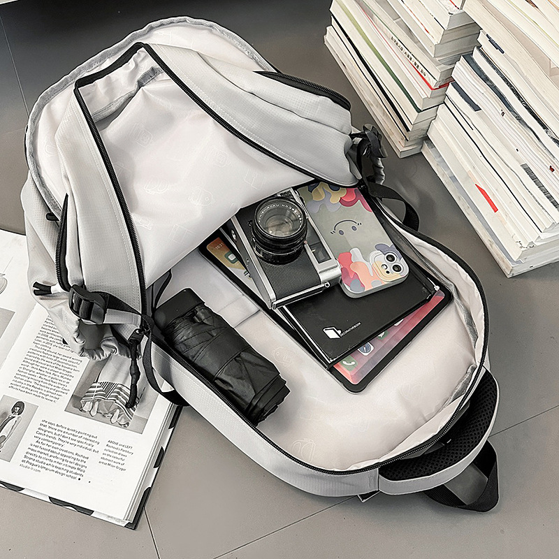 The new Korean-style Instagram trendy letter print backpack from the "Schoolbag Man" is casual, simple, lightweight and has a large capacity Application Scenario