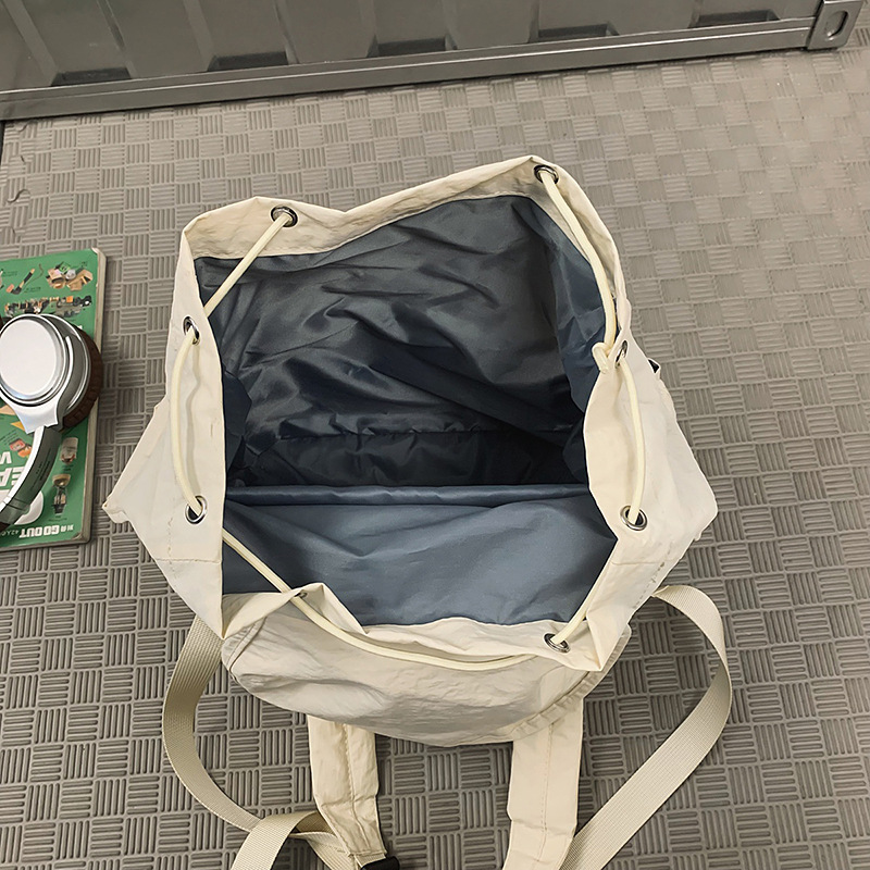 New drawstring large-capacity Korean nylon versatile backpack, travel bag, niche lightweight and casual backpack for commuting Application Scenario