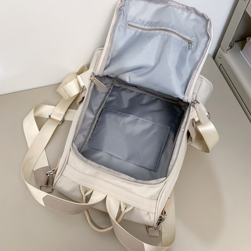 2025 New anti-theft design versatile backpack, Japanese ins commuting backpack, simple and casual large-capacity schoolbag Application Scenario