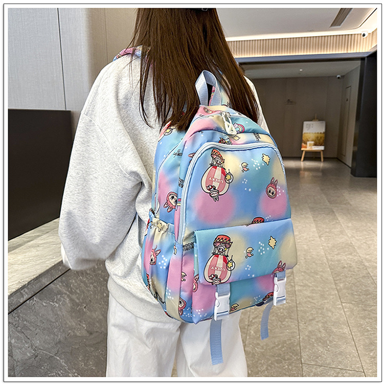 Cute schoolbag, colorful color-smeared double backpack, lightweight schoolbag for primary and secondary school students, large-capacity lightweight and artistic campus backpack Application Scenario