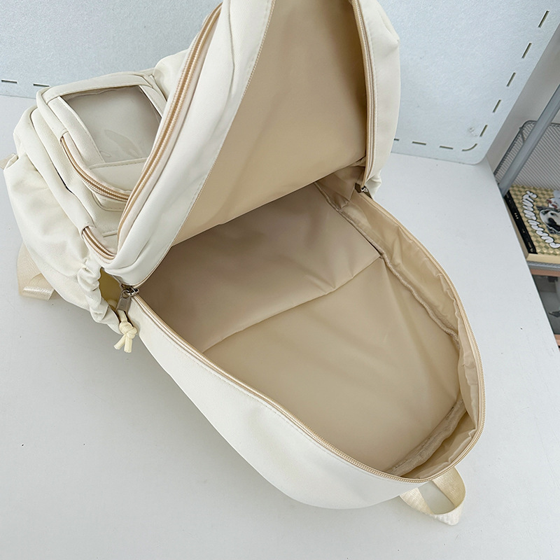Casual solid-color backpack, Japanese-style lightweight and versatile, a niche transparent bag for the anime exhibition, a cute color-blocking tutorial bag Application Scenario