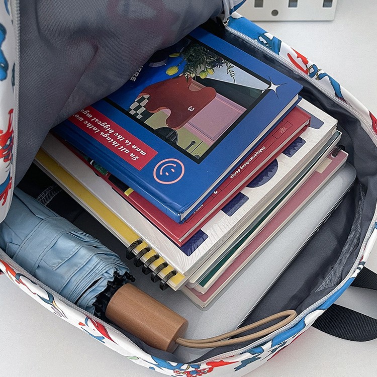 A new Korean-style Instagram backpack with a high level of appearance, trendy and cool personality, and graffiti. It is a lightweight and large-capacity backpack for junior and senior high school students Application Scenario