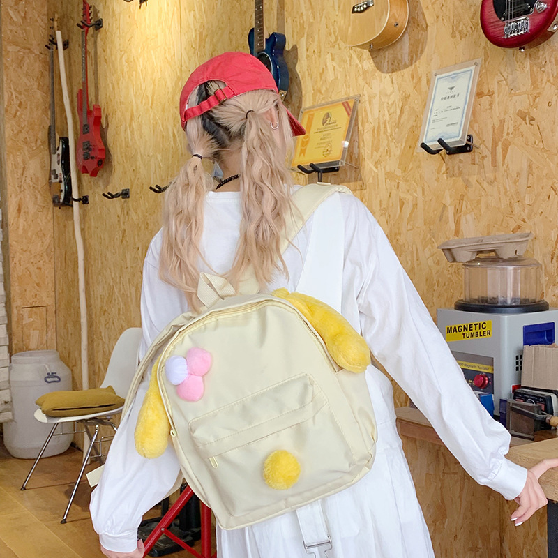 The 2025 new summer collection features a quirky yellow bag with a large capacity and cute cartoon canvas backpack for women details Picture