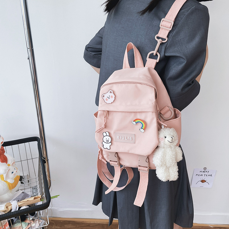 Mini solid-color backpack, Korean style sweet and simple schoolbag for girls, cute children's schoolbag, fresh and clean crossbody bag details Picture