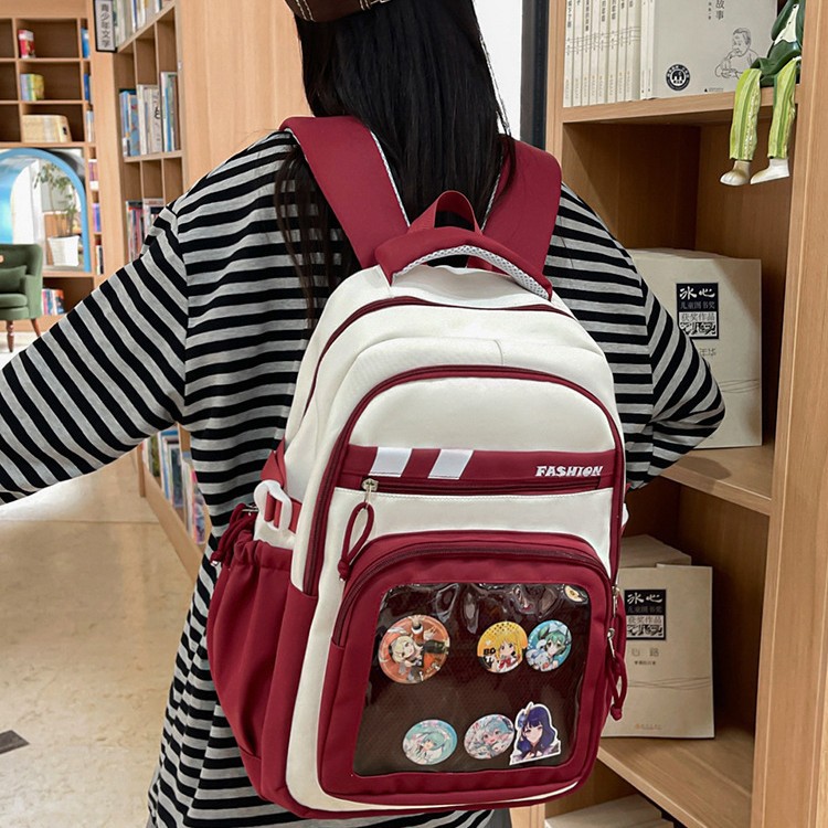 2025 New Korean version high-appearance-level cartoon badge backpack, large-capacity multi-compartment backpack, lightweight and simple backpack full figure