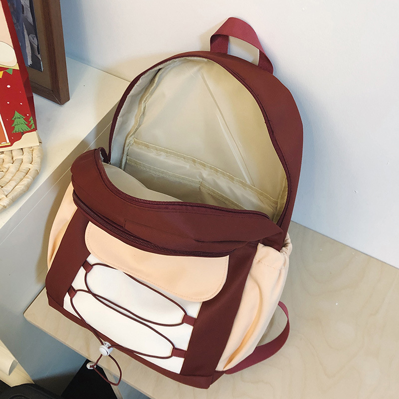 2025 New lightweight travel backpack, Korean-style nylon water-resistant backpack, simple schoolbag in various sizes Application Scenario