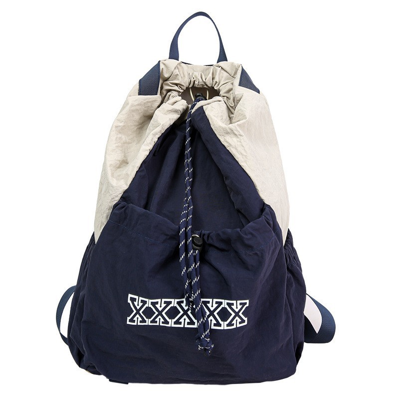 The new forest-themed ins badminton backpack with a high aesthetic level, fresh and sweet, drawstring opening, and a color-blocking lightweight backpack Item Picture