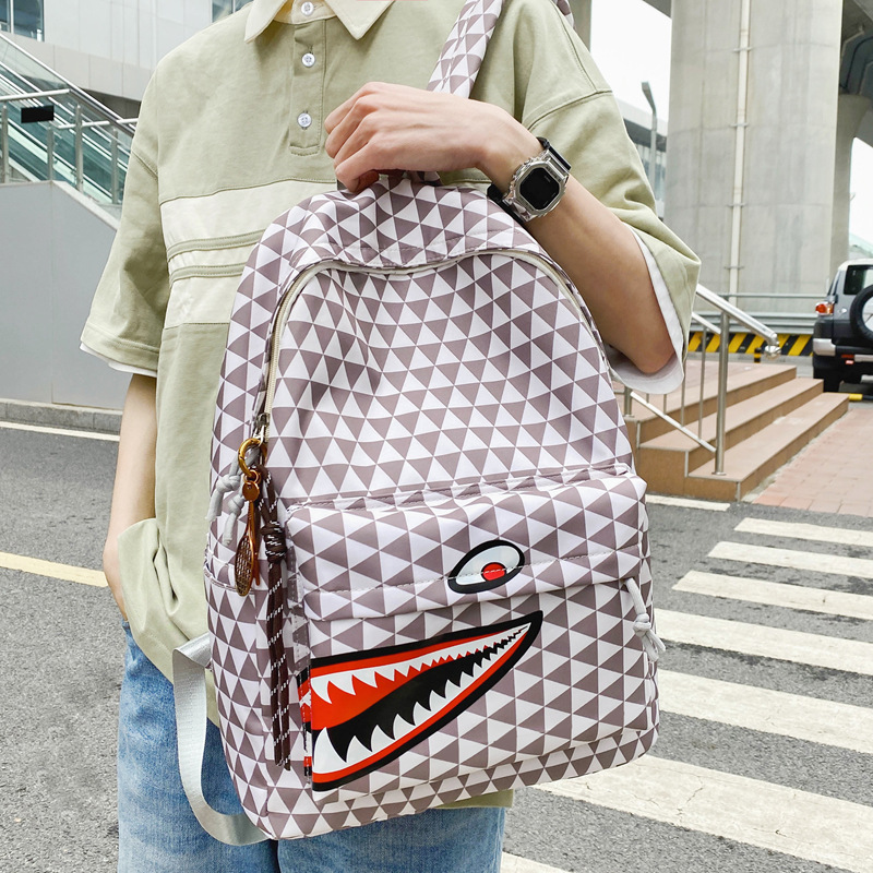 New Korean-style checkered backpack, casual and trendy large-capacity computer bag, and schoolbag for primary and secondary school students, junior high school and senior high school full figure