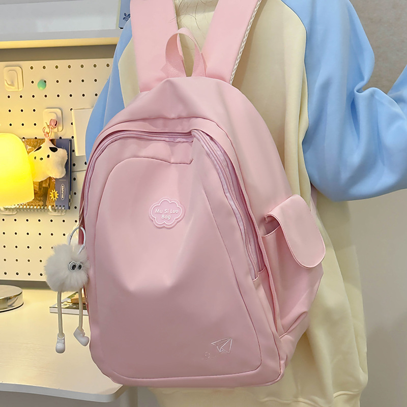 The schoolbag is an Instagram female Korean college student with a high level of appearance, simple and solid color, versatile backpack, and a lightweight Japanese-style travel backpack details Picture