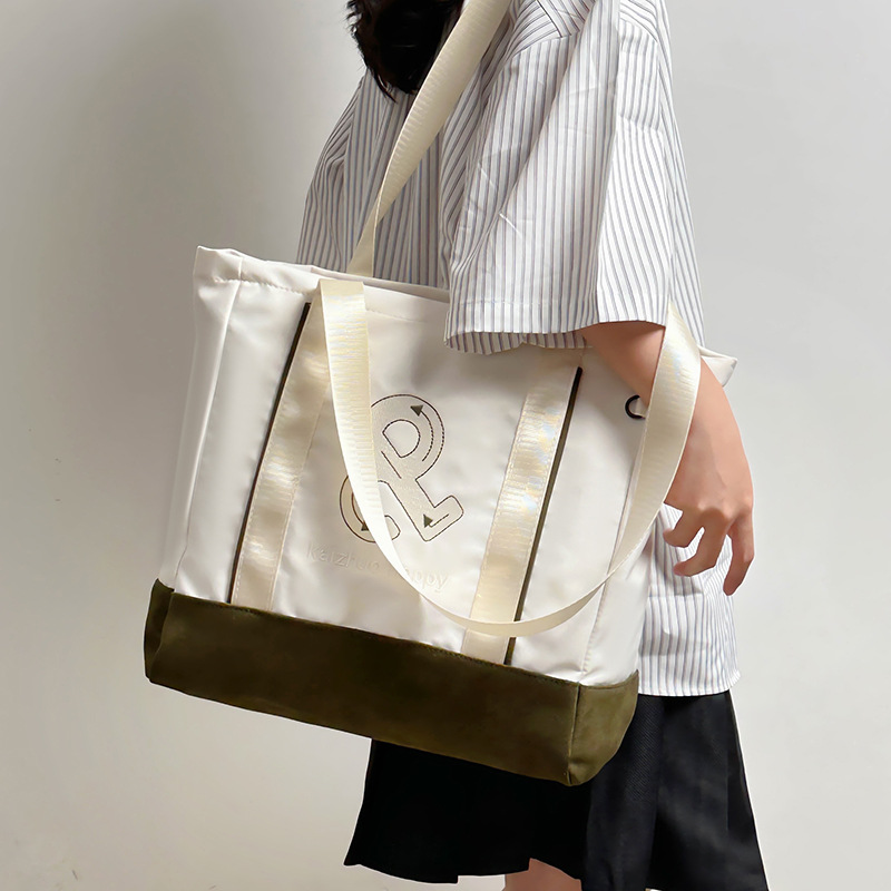 Simple single-shoulder bag for women, 2024 new versatile large-capacity tote bag, student class bag, commuting color-blocking handbag full figure