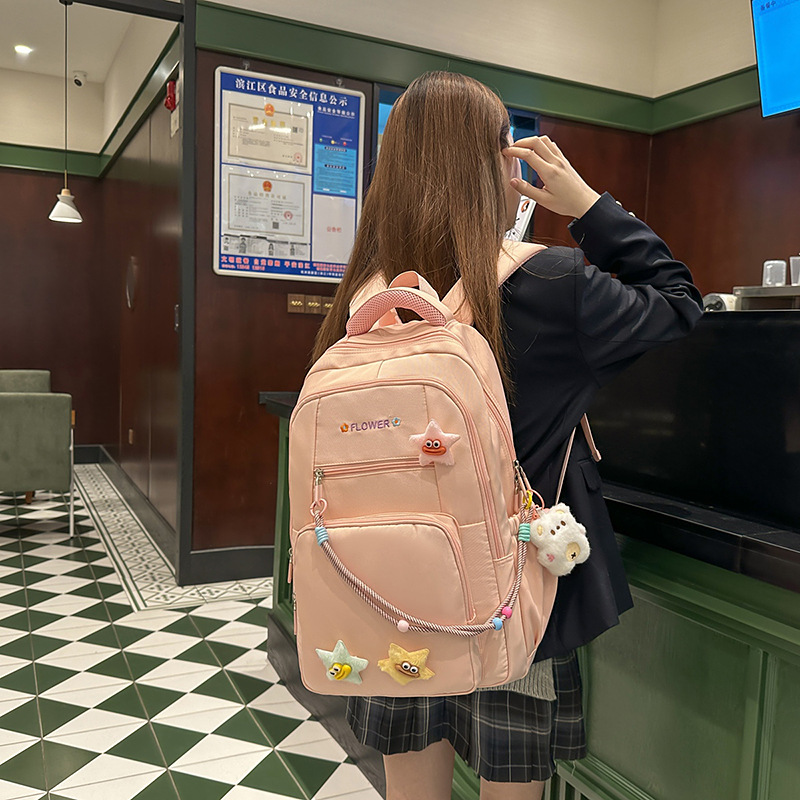 2025 New student large-capacity multi-compartment backpack, fresh college style backpack, student casual schoolbag full figure