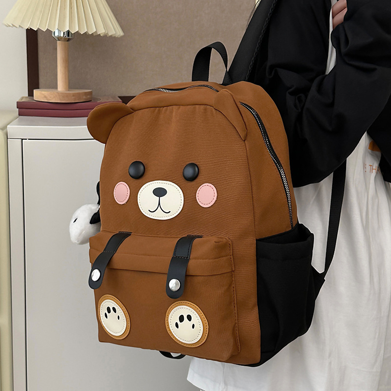The new cartoon schoolbag is cute and adorable. It's a small backpack for children's travel, with a unique and creative design. It's a soft and cute backpack for girls' travel full figure