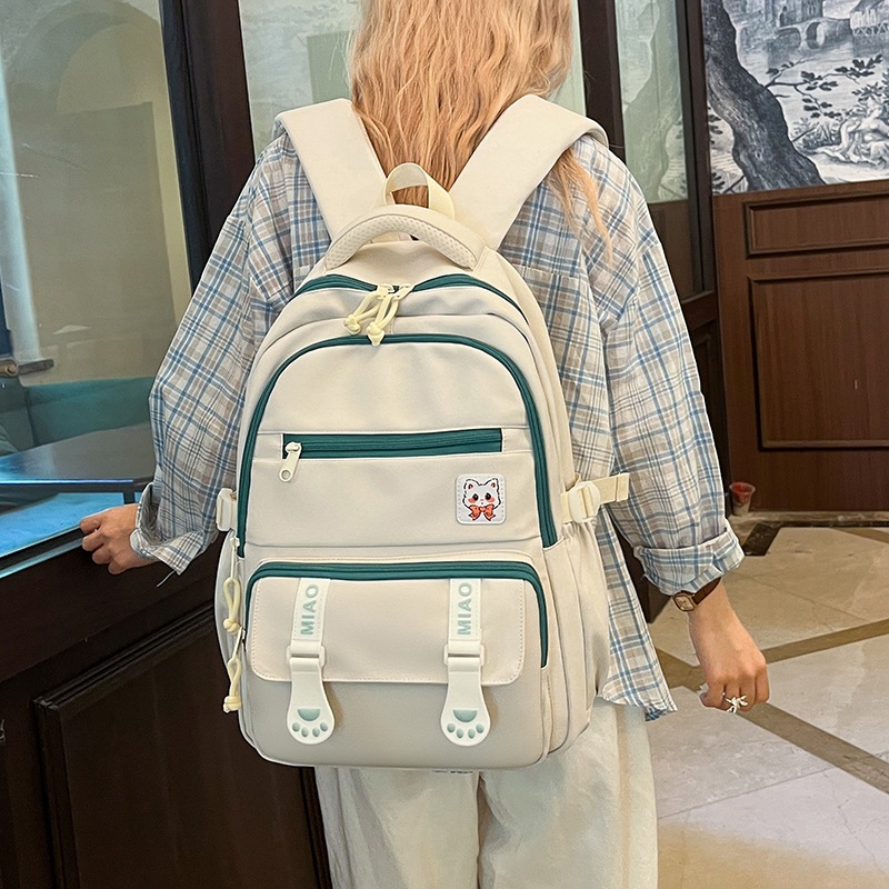A new high-appearance-level forest-themed ins fresh and sweet candy-colored backpack for junior and senior high school students with large capacity details Picture