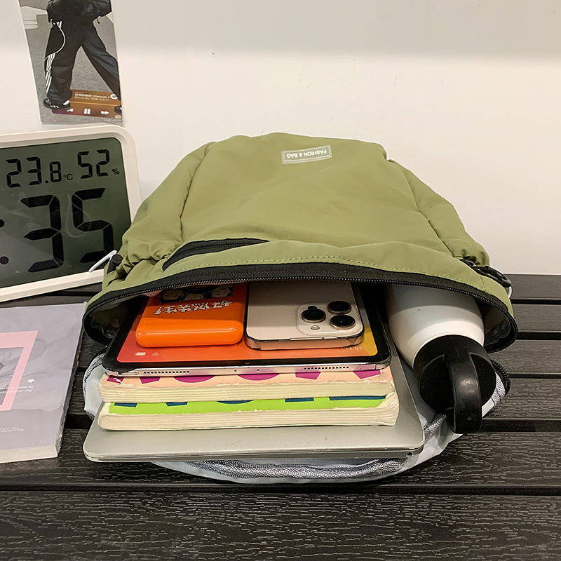 A new high-appeal mountain-themed Instagram multi-pocket solid-color drawstring large-capacity backpack for mountain climbing and travel Application Scenario