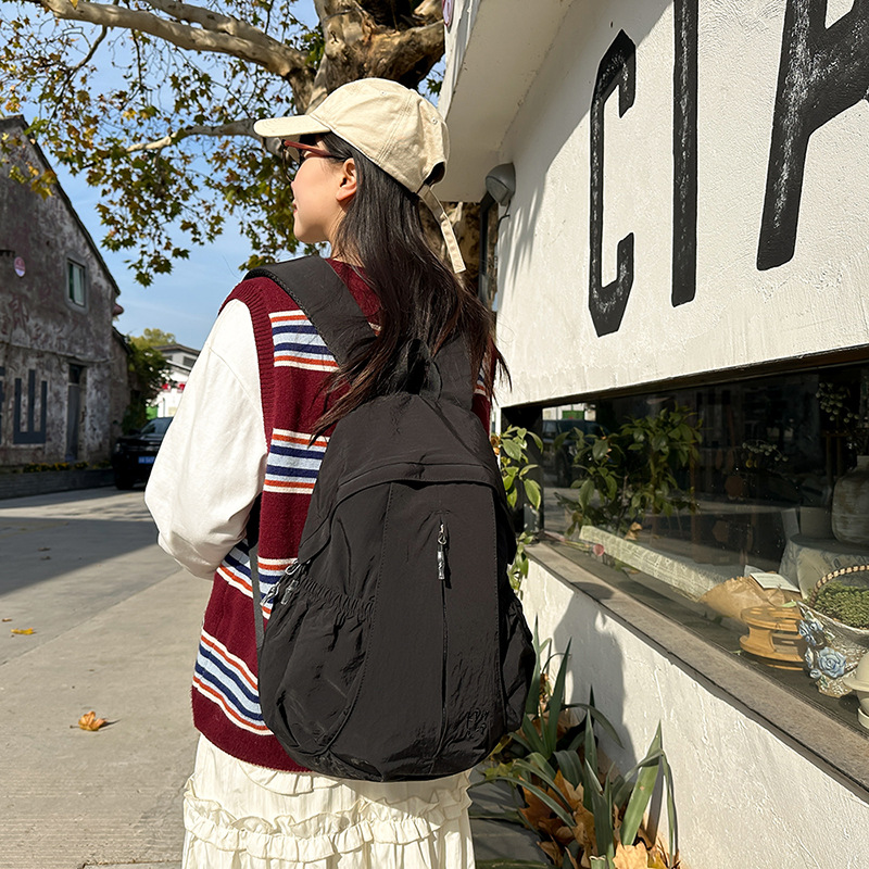 Japanese-style lightweight, simple and versatile solid color schoolbag, female college student commuting backpack, male junior and senior high school student backpack details Picture