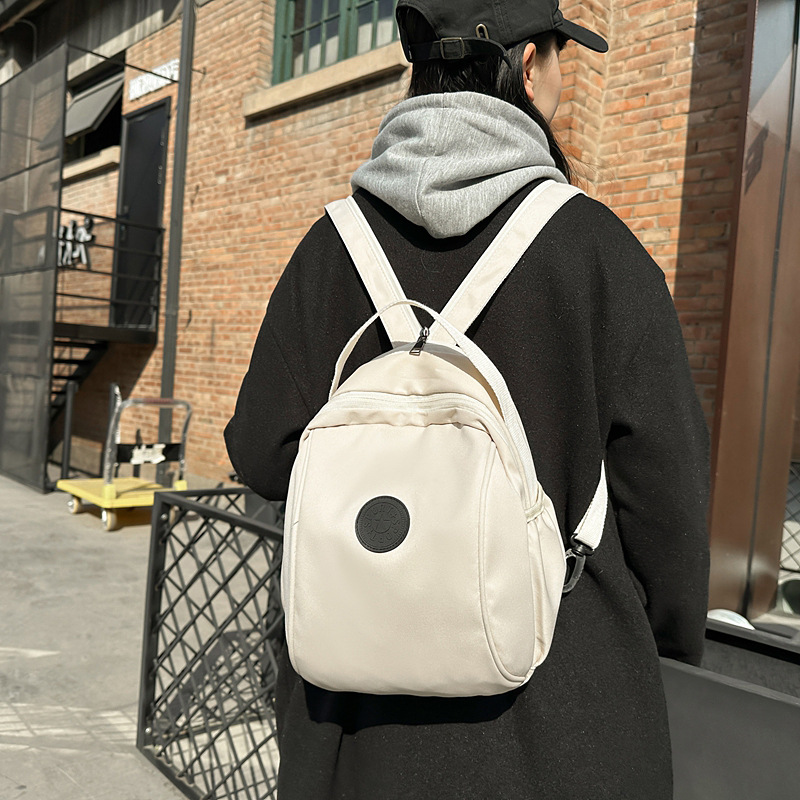 Japanese-style original solid-color letter schoolbag, simple and lightweight backpack, large-capacity schoolbag for commuting to school, casual chest bag full figure