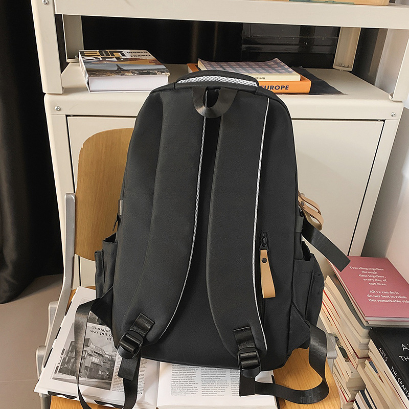 A new Korean-style Instagram backpack with a high level of appearance, solid color and niche design, for couples to travel lightweight and with large capacity Specification drawing