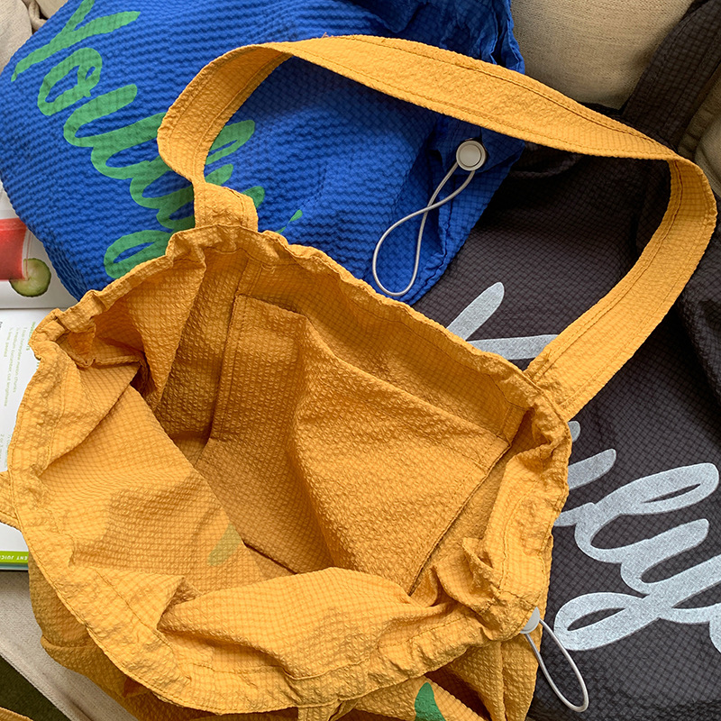 New lightweight Korean-style backpack with drawstring, high appearance level, ins Japanese tote commuter handbag, large capacity single-shoulder bag Specification drawing