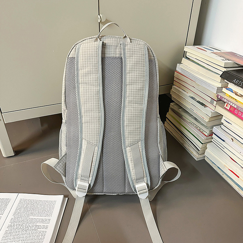 A new high-appeal Korean-style ins letter backpack for college students, featuring a simple and elegant design for mountain climbing and travel, with a large capacity on both shoulders Specification drawing