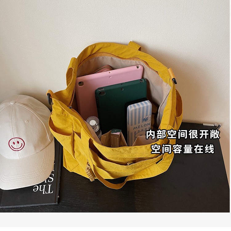 A new Japanese-style commuter forest-themed artistic large-capacity tote bag, a casual, simple and versatile commuter crossbody bag for women Application Scenario