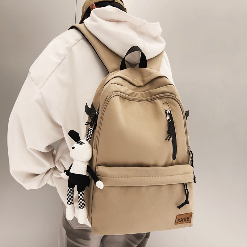 Trendy brand men's simple and large-capacity travel backpack, Korean version of ins, lightweight backpack for junior and senior high school students full figure
