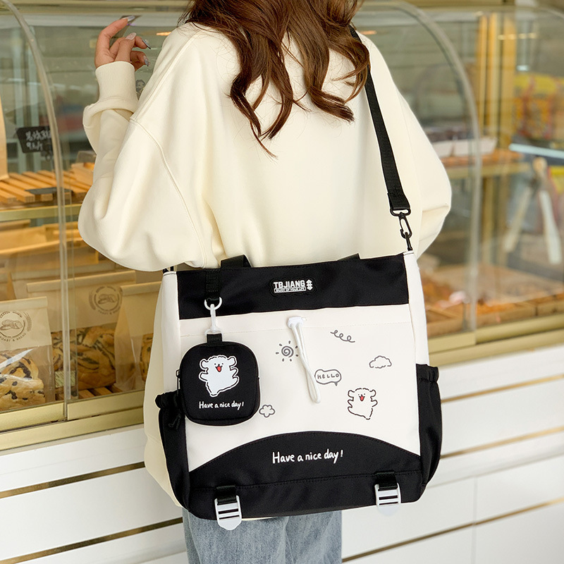 Primary school student crossbody bag, girl tutoring schoolbag, junior high school student handbag, cute book bag, tutoring single-shoulder bag details Picture