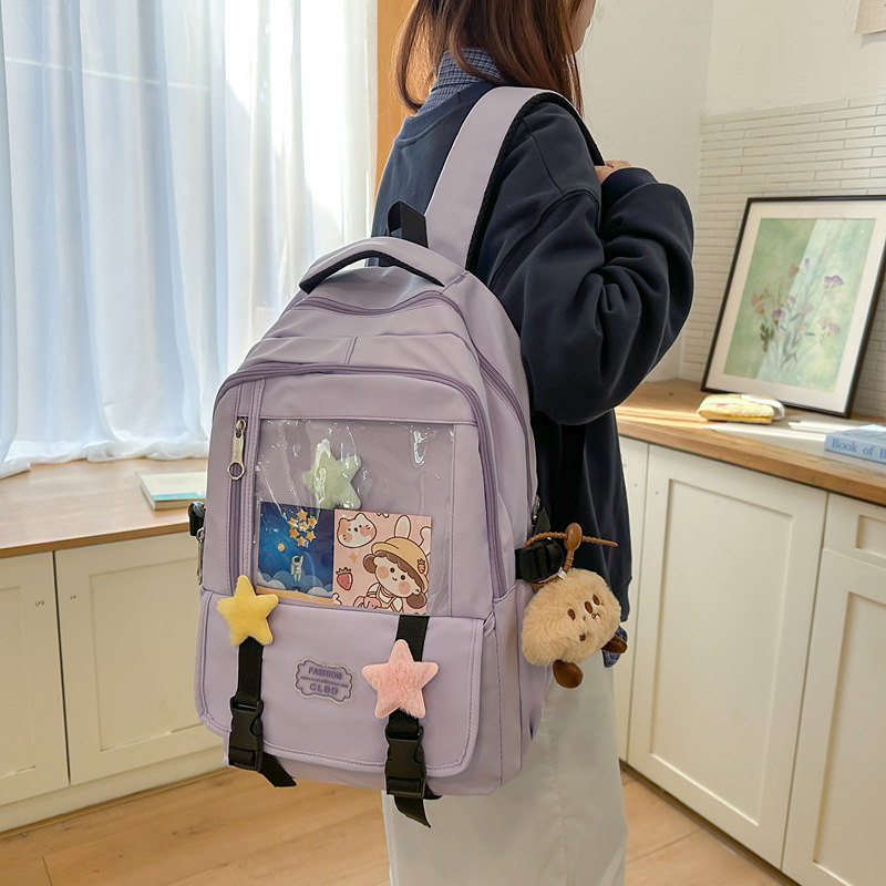 A new Japanese-style backpack with a high aesthetic level, fresh and sweet candy color, is simple, lightweight and has a large capacity for junior and senior high school students full figure