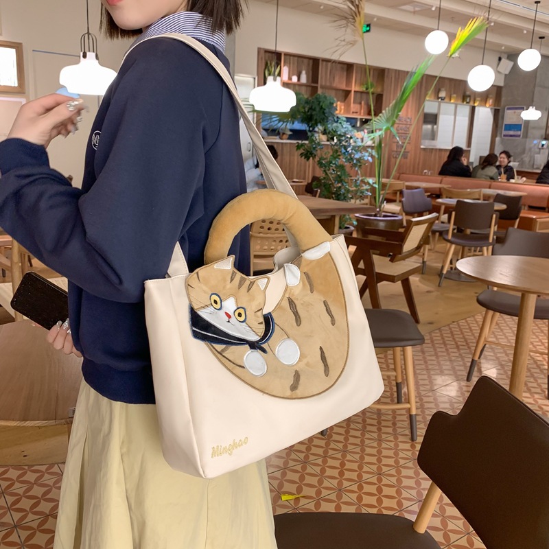 Large-capacity cat bag for women, 2024 new ins Japanese style versatile cartoon shoulder bag, student tote bag for class details Picture