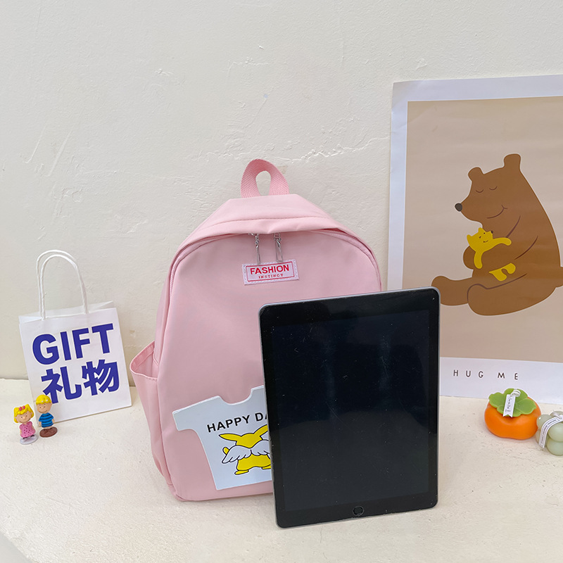 The 2022 new color-blocking large-capacity backpacks for boys and girls, Harajuku style schoolbags, and children's cartoon backpacks are in a trend Specification drawing