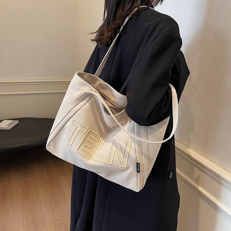 2025 New canvas bag, women's single-shoulder large bag, artistic student casual, fashionable and simple, large-capacity tote bag full figure