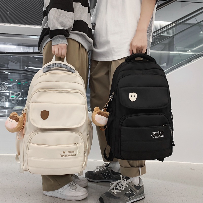 New large-capacity schoolbag in the style of a girl's school, a Korean version of a backpack for junior and senior high school students, and a simple college student schoolbag details Picture