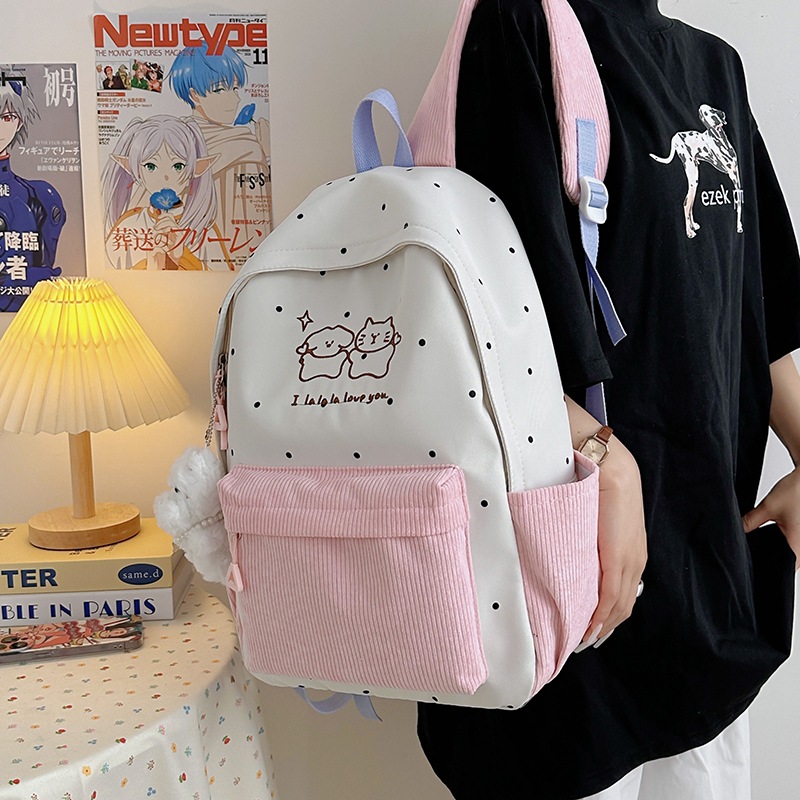 A new Japanese-style backpack with a high level of appearance, sweet, fresh and cute printed patterns, and a large-capacity casual backpack for junior and senior high school students full figure