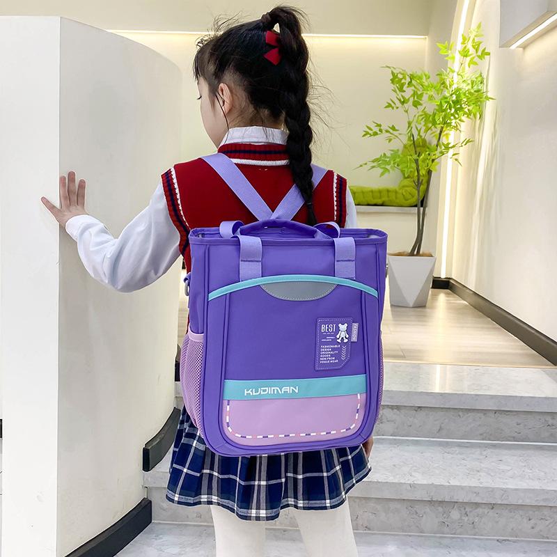 New waterproof hand-held bag for primary school students, tutorial bag, backpack, versatile, large-capacity tutorial bag with logo printing full figure
