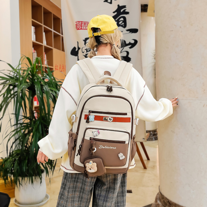 New large-capacity, multi-compartment, versatile and simple schoolbag for grades 3-6, casual commuting, lightweight and niche backpack details Picture