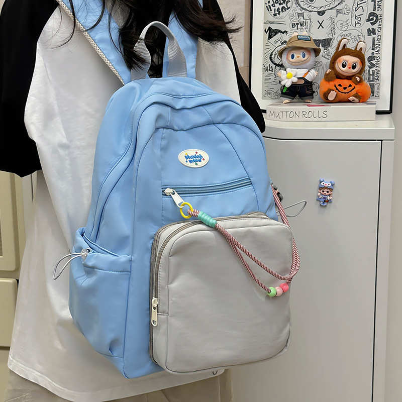 Cute primary school student backpacks, transparent schoolbags with a college style, solid-color smudged pain bags, simple and niche backpacks for junior and senior high school students details Picture