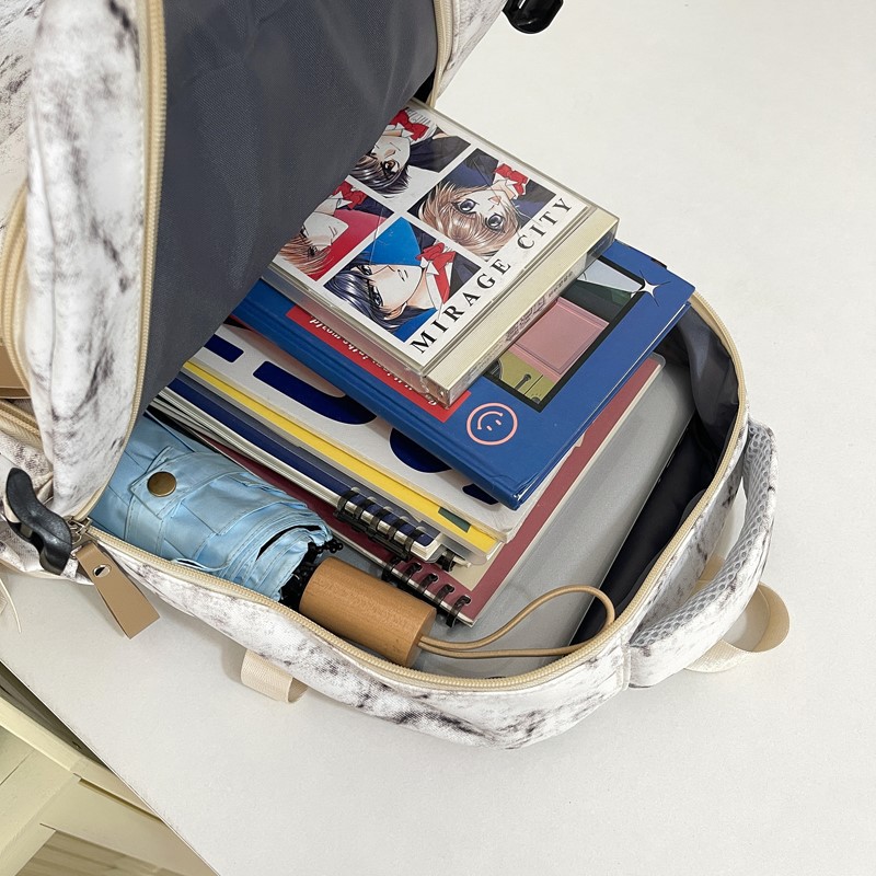 A new high-appearance-level, fresh and sweet tie-dyed backpack for junior and senior high school students, which is light, simple and has a large capacity Application Scenario