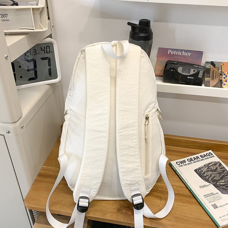 Japanese-style lightweight, simple and versatile solid color schoolbag, female college student commuting backpack, male junior and senior high school student backpack Specification drawing