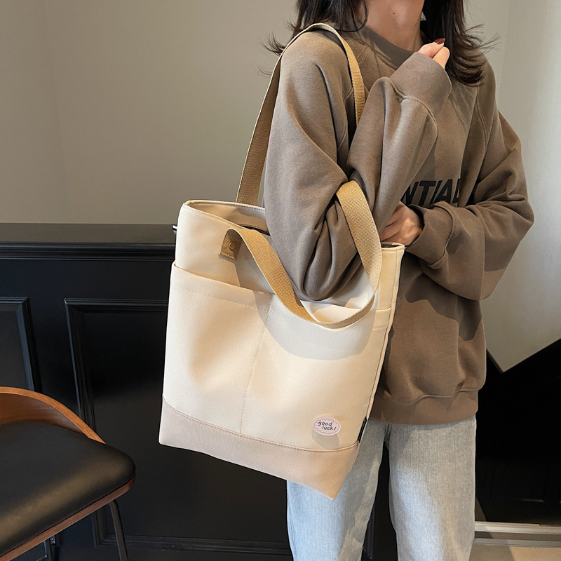 Casual commuting bag, women's large-capacity bag, 2025 new style fashionable hand-held shoulder canvas bag, work tote bag full figure