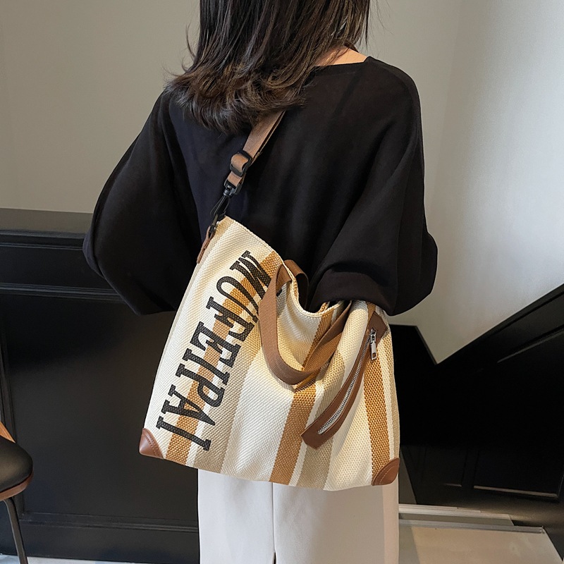 Casual striped simple large-capacity bag for women 2025 new trendy and versatile ins commuter single-shoulder tote bag full figure