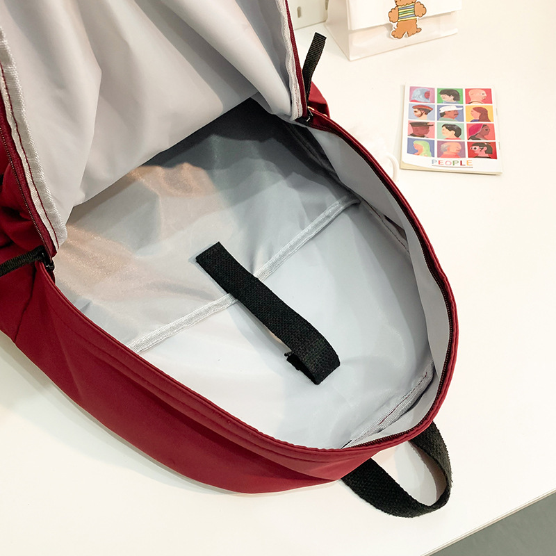 New fashionable solid color large-capacity schoolbag, Korean style Instagram versatile and simple backpack, casual spring outing lightweight backpack Application Scenario