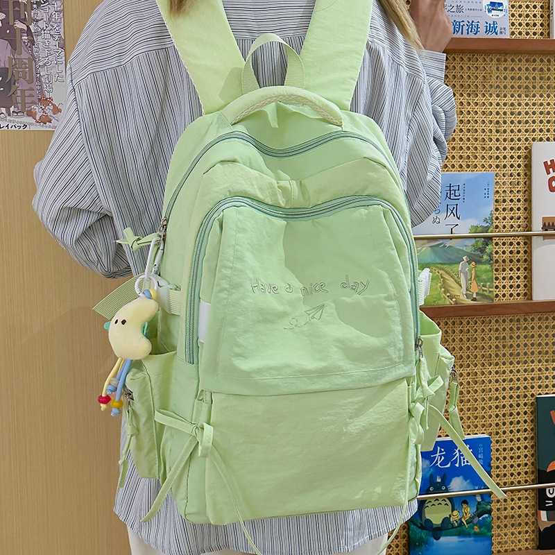 Japanese-style lightweight solid-color backpack, large-capacity outdoor travel backpack, casual and versatile college student commuting schoolbag details Picture